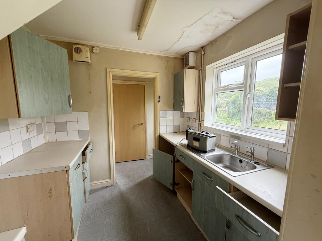 Lot: 135 - SEMI-DETACHED HOUSE IN NEED OF IMPROVEMENT IN VILLAGE SETTING - Kitchen of Village House in Need of Improvement